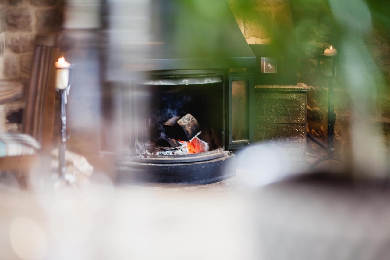 The George Inn Barford St Michael Luaran gambar A fireplace in the restaurant